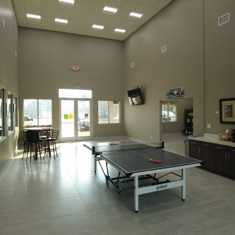 recreation room interior with ping pong table